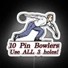 Brighten up your game room with this 10-pin bowling light.