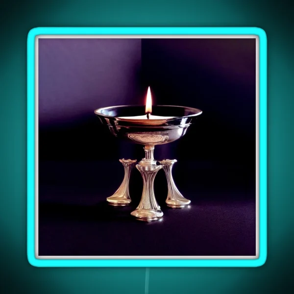 A Lit Candle In A Silver Bowl On A Table RGB Neon Sign