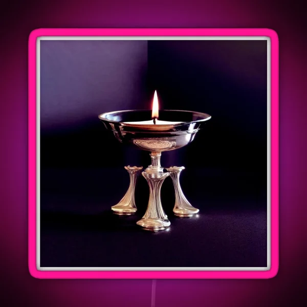 A Lit Candle In A Silver Bowl On A Table RGB Neon Sign