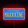 Eye-catching A24 Maxxxine license plate number displayed in vibrant RGB neon.