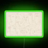 Vibrant abstract face designs with neon colors in modern rooms.