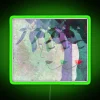 RGB Neon Sign Featuring Abstract Leaf and Face Silhouettes