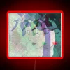 Bright Neon Sign Featuring Vibrant Abstract Leaves and Faces Designs