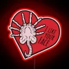Alien Facehugger inspired neon sign with vibrant RGB glowing accents.