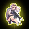 Vibrant Neon Sign Featuring Anime Girl Holding Gun in Colors.
