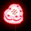 Neon anti-hero cake design adds rebellious flair to your space.