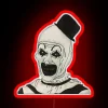 Vibrant neon art print of creepy clown character in color.