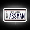 Eye-catching neon sign featuring the 'AssMan' license plate design.