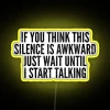 Quirky introvert humor decor, colorful neon LED sign with funny quotes.