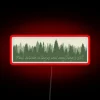 Vintage neon sign highlighting nostalgic journey between two charming village backdrops.