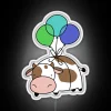 Vibrant LED cow neon decoration in radiant multicolor RGB hues.