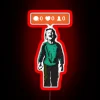 Satirical street art mocking social media angst in bold neon