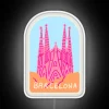 Neon travel souvenir stamp featuring iconic Barcelona cityscape in colors.