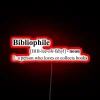 Neon definition of bibliophile in modern, colorful, RGB lighting style.