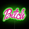 Neon pink and green Barbiecore inspired bedroom wall decoration lighting.