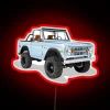 Add vintage road trip vibes with this blue neon sign