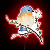 Radiant bluebird perches on lush berry branch in vibrant neon hues.