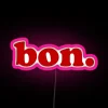 Modern French phrase in vibrant colored RGB neon light installation