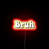 Neon 'Bruh' sign in bright cheerful yellow color glow