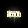 Neon lit 'Bruh' logo in vibrant yellow and RGB colors