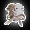 Vibrant Bunnies Dance under Rainbow Glowing Neon Light Display Sign