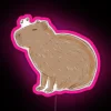 Vibrant, large-scale RGB Capybara lighting decoration for home entertainment spaces.
