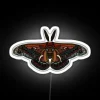 Colorful Neon Sign Featuring Vibrant Insect-Inspired Design Elements Together