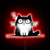 Vibrant colorful chaos illuminated by glowing neon cat silhouette