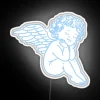 Vibrant cherubic angel face radiates colorful glow with neon charm.