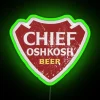 Traditional Native American-inspired neon bar decor featuring Chief Oshkosh's face.