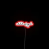 Neon sign proudly declaring faith with radiant 'Child of God' design.