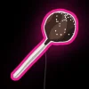 Vibrant colorful RGB neon sign art chocolate cake pop display