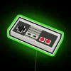 Glowing Retro Gaming Sign with Classic Controller Colorful Illuminated Design