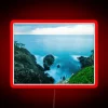 Capturing the serenity of coastline in vibrant long exposure neon.