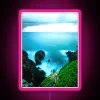 Glowing coastline landscape captured in vibrant long exposure neon detail.