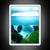Vibrant seaside ambiance with coastal long exposure color changing LED lights