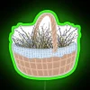 Vintage cottage-inspired picnic basket with colorful neon lighting accents.