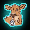 Vibrant neon sign saying cows love oat milk in bold.