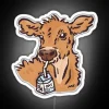 Retro-style LED cow-themed neon sign advertising oat milk and love