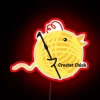 Quirky humor decor featuring colorful crochet tools and yarn accessories
