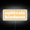Add warmth with bright yellow kindness inspired neon LED signs