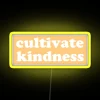 Vibrant kindness-inspired yellow neon sign for wall or desktop display