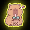 Cute capybara cartoon character sipping bubble tea in neon light