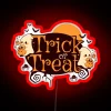 Colorful neon sign featuring cute ghosts trick-or-treating in vibrant colors.