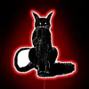 Add feline flair to any space with this bold sign.