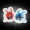 Glowing Genshin Impact character lightbox featuring Diluc & Kaeya in color