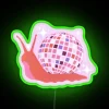 Vibrant glow of colorful lights on disco snail neon sign.