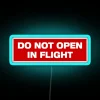 Do Not Open in Flight Safety Caution Illuminated Neon Sign