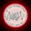Start your own quirky community with this cult neon sign.