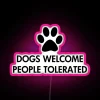 Vibrant RGB LED neon sign welcoming dogs and their owners.